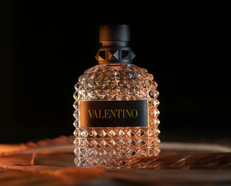 Elegant close-up of Valentino perfume bottle showcasing luxury and premium design.